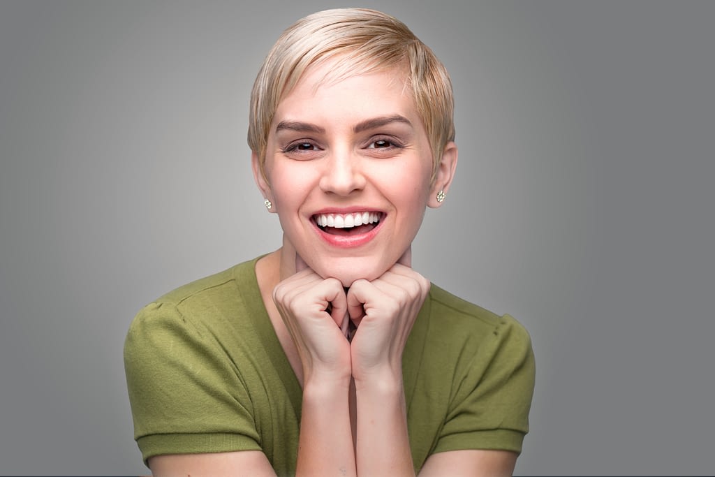 a lady with natural white teeth
